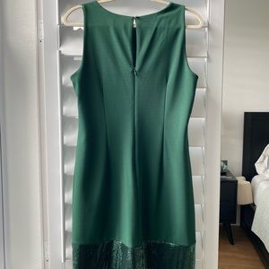 Holiday sparkle! Beautiful Christmas green sheath with 5.5” band of sequins.